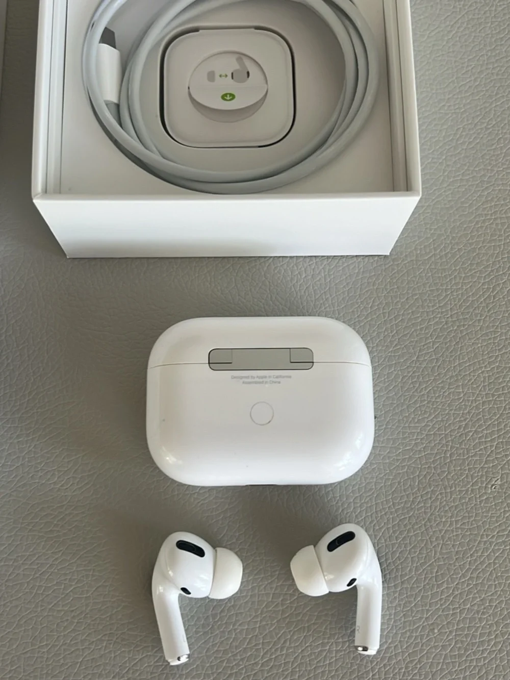 Apple AirPods Pro with charging cord